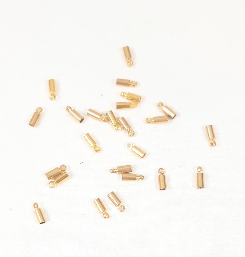 Appr&ecirc;ts bijoux: 2 embouts dor&eacute;s cordon rond 2mm