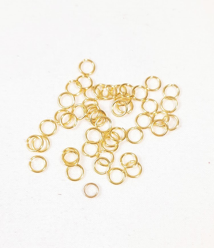Appr&ecirc;ts bijoux: lot de 100 anneaux de jonction ouverts 5mm dor&eacute;s