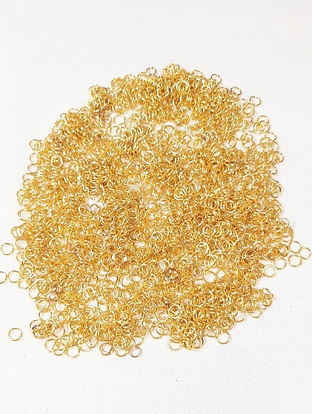 Appr&ecirc;ts bijoux: lot de 100 anneaux de jonction ouverts 5mm dor&eacute;s