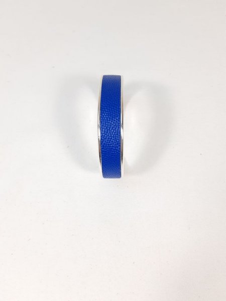  Bracelet jonc métal et cuir coloris bleu.