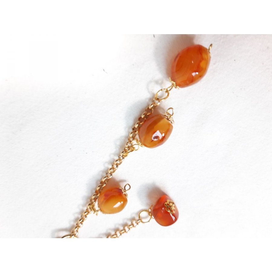 Bijou de sac pompon cuir vachette orange et cornaline, idée Fête des Mères.