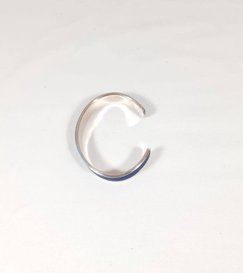 Bracelet jonc métal et cuir, coloris bleu.