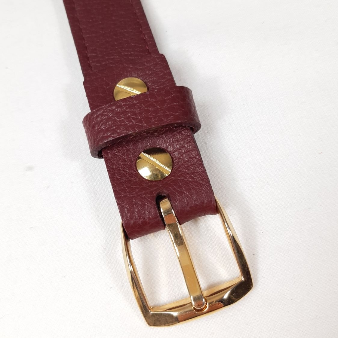 Ceinture pour Elle, cuir de vachette grainé tannage minéral coloris bordeaux