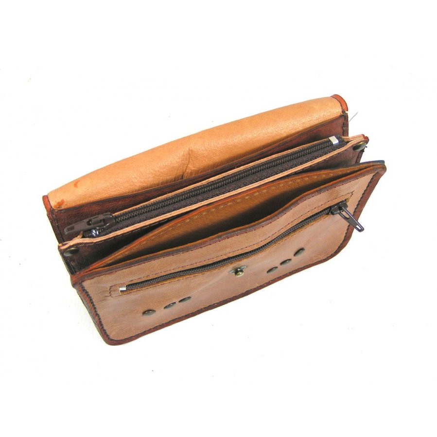 Pochette cuir pour ceinture, sûre et discrète. Accessoire pratique et élégant.