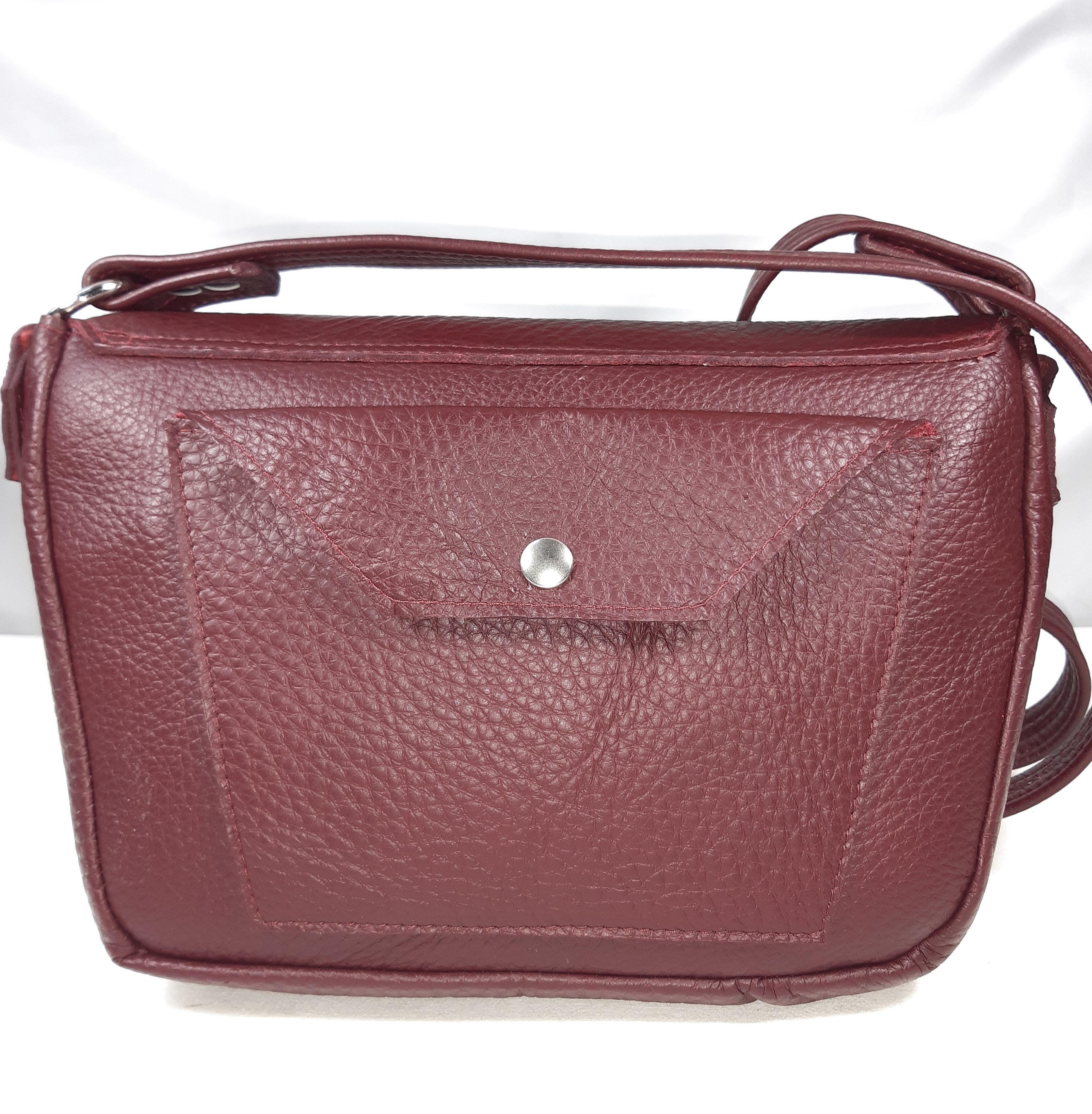 Sac bandouli&egrave;re en cuir bordeaux