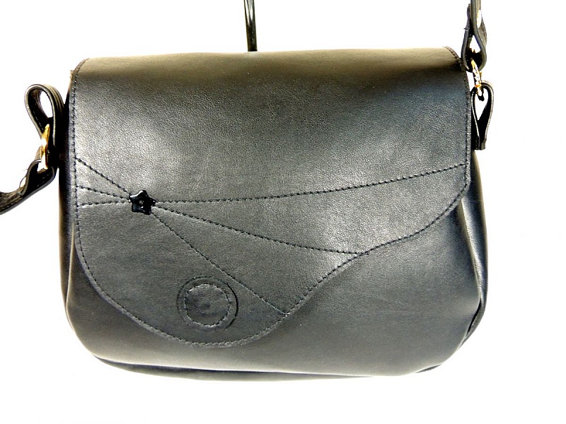 Sac &agrave; main cuir de vachette coloris noir.