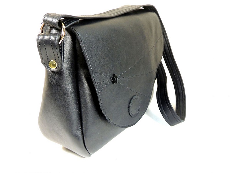 Sac &agrave; main cuir de vachette coloris noir.