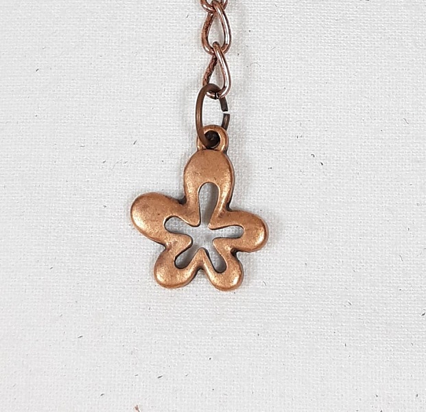 St Valentin! Bijou de sac pompon cuir de vachette coloris marron.