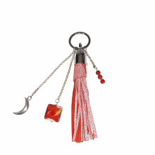 Bijou de sac en cuir de chèvre , breloque pierres de roche et verre.